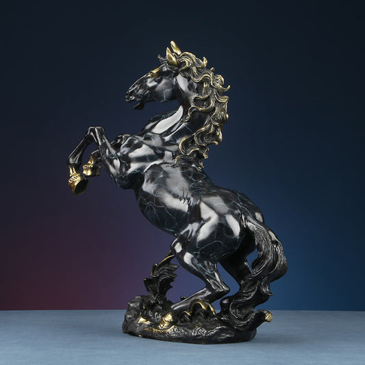 Black and gold rearing horse statue with intricate golden details, a Feng Shui symbol of success and strength, displayed as stylish home decor against a dark blue gradient background
