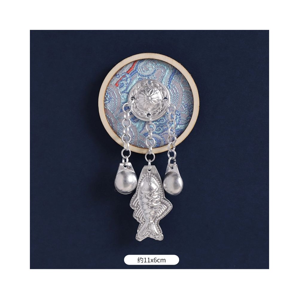 Blue circular fridge magnet with tassel ornaments