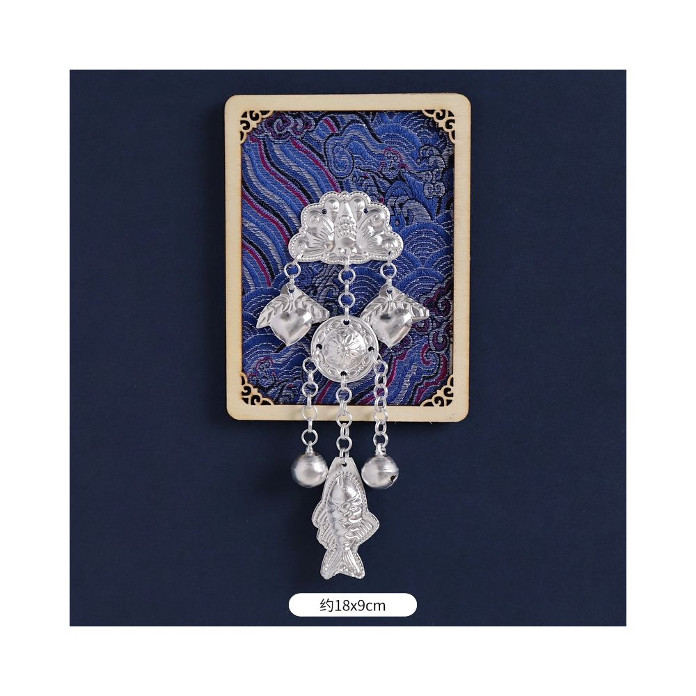 Blue floral refrigerator magnet with silver hanging charms.