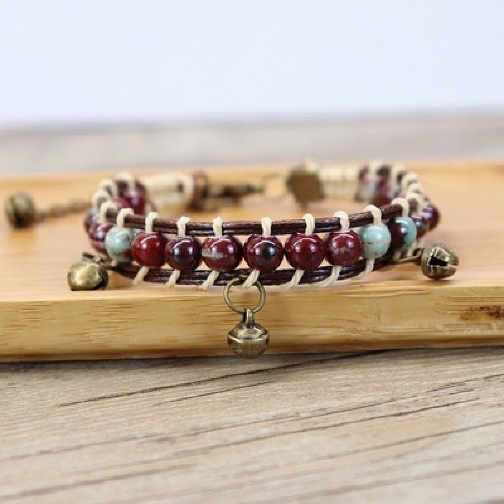 The adjustable design ensures a comfortable fit, adding a playful, earthy touch to any outfit.
