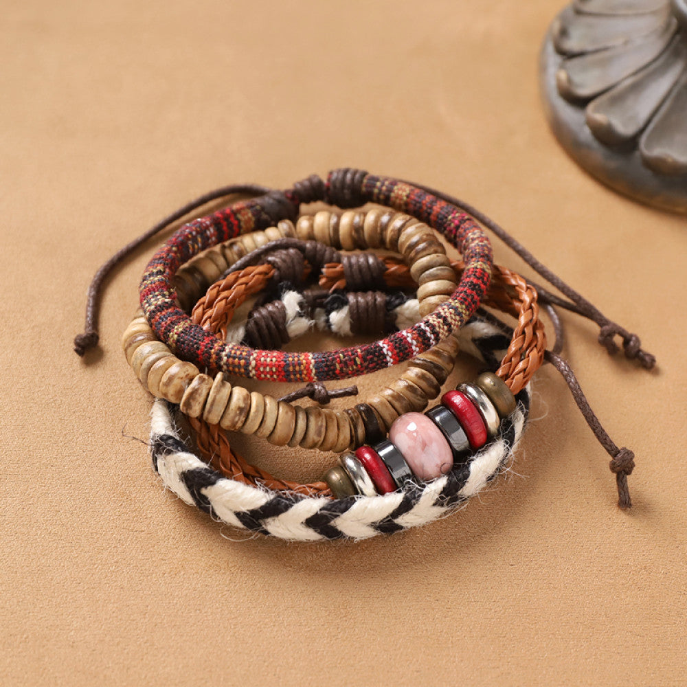This bohemian stackable bracelet set combines woven cords, wooden beads and leather details, creating a retro layered style perfect for casual everyday wear