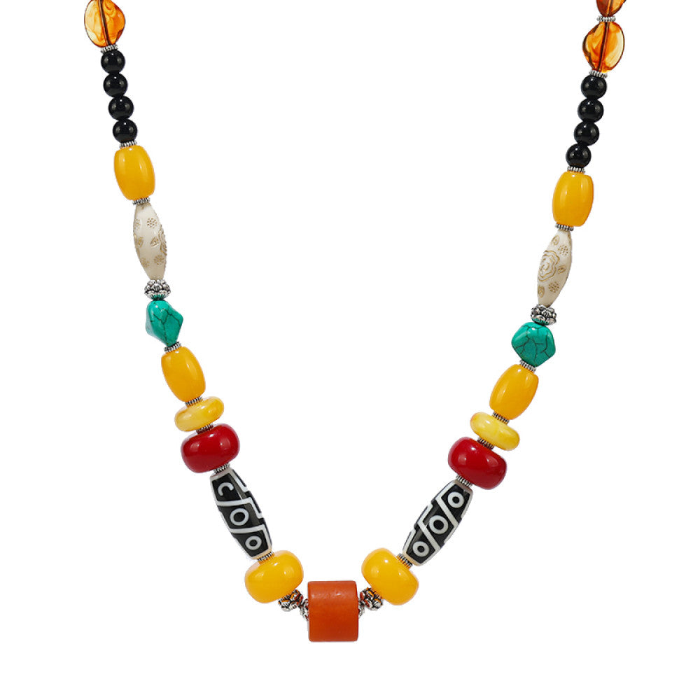 Vintage Bohemian ethnic tribal multi-color beaded necklace with Tibetan style design, showcased on a model in traditional ethnic attire, ideal for boho fashion enthusiasts 02