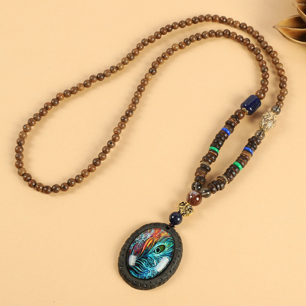 Vintage bohemian ethnic beaded necklace with jade pendant and multi-color beads, ideal for spiritual boho fashion, displayed with a decorative flower against a neutral background 04