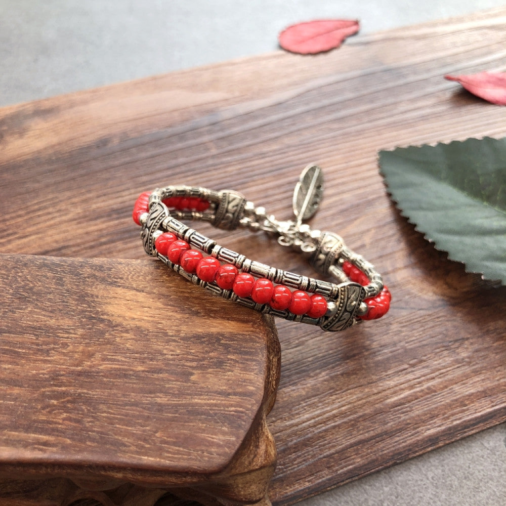 Vintage bohemian ethnic black beaded bracelet with silver engraved accents, displayed on a wooden surface, ideal for boho fashion enthusiasts 03