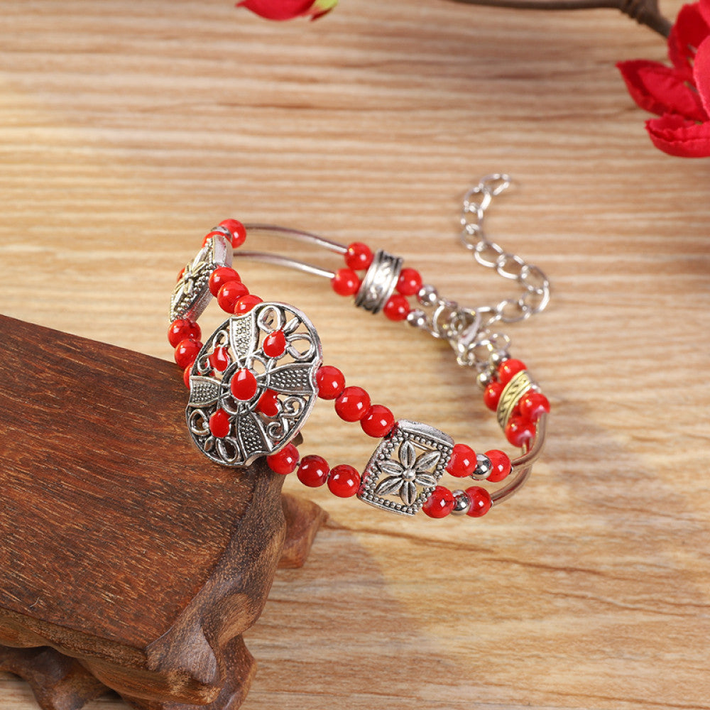 Vintage bohemian ethnic colorful beaded bracelet with multi-color stone beads and silver accents, displayed on a wooden surface, ideal for boho fashion enthusiasts 05