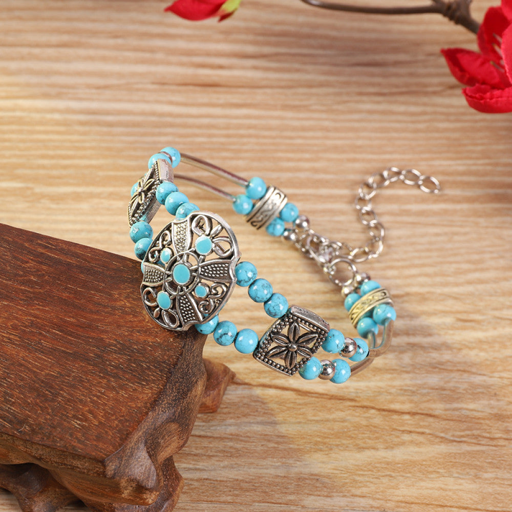 Vintage bohemian ethnic colorful beaded bracelet with multi-color stone beads and silver accents, displayed on a wooden surface, ideal for boho fashion enthusiasts 06