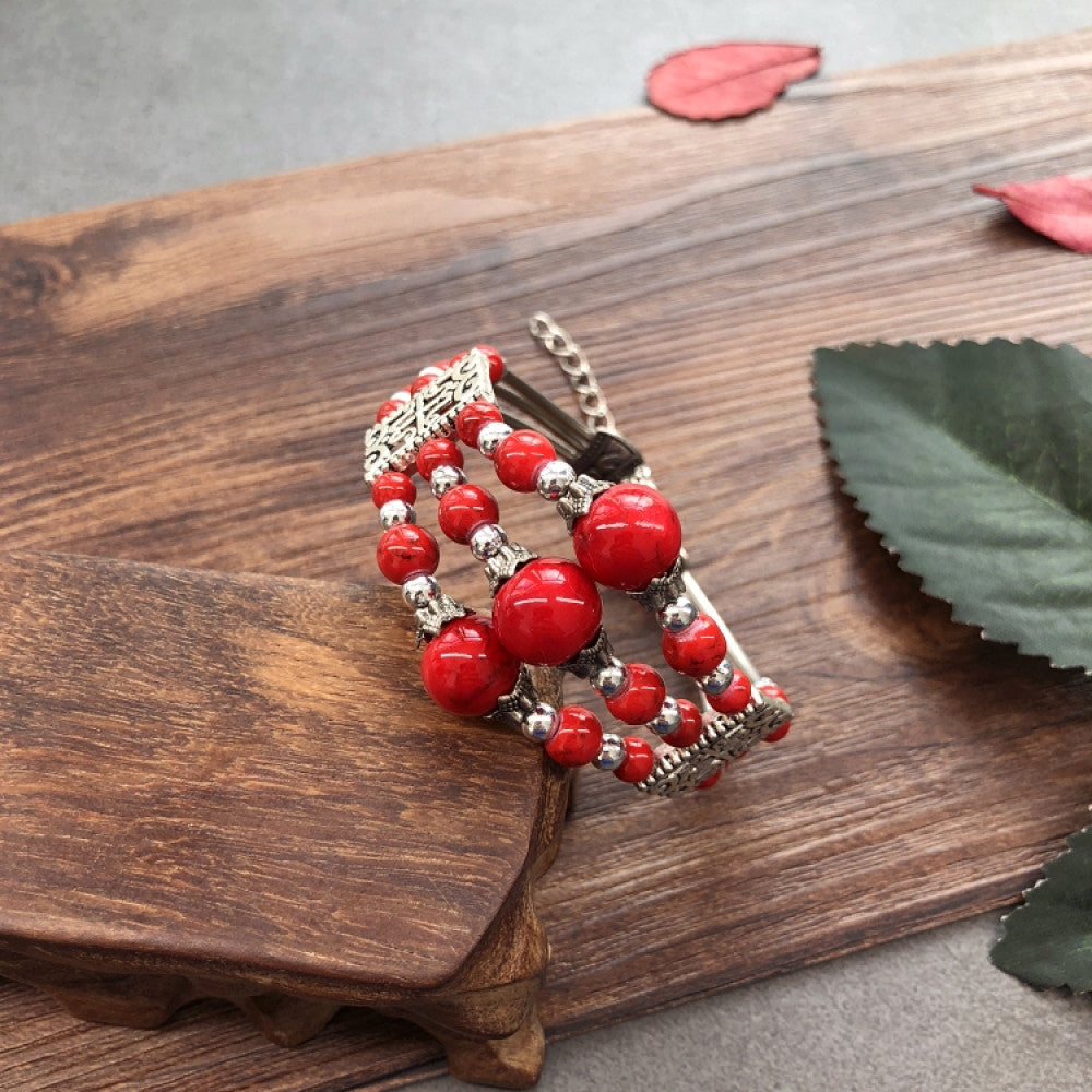 Vintage bohemian ethnic colorful beaded bracelet set with silver fish accents, displayed on a wooden surface, ideal for boho fashion enthusiasts 05