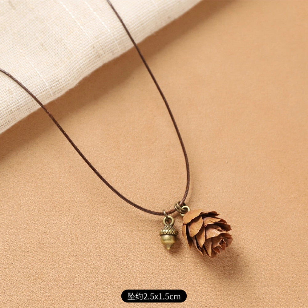 Vintage bohemian ethnic necklace with round natural stone pendant, featuring earthy brown tones and cord design, displayed on a neutral background with linen accent, ideal for boho fashion enthusiasts16