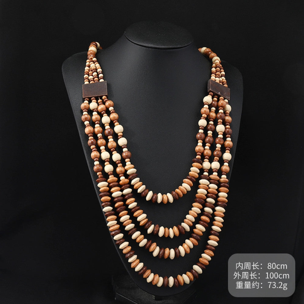 Vintage bohemian multi-layer wood beaded necklace with turquoise and colorful accents, featuring intricate layered design, ideal for ethnic tribal and boho fashion, displayed on a black mannequin against a dark background 07