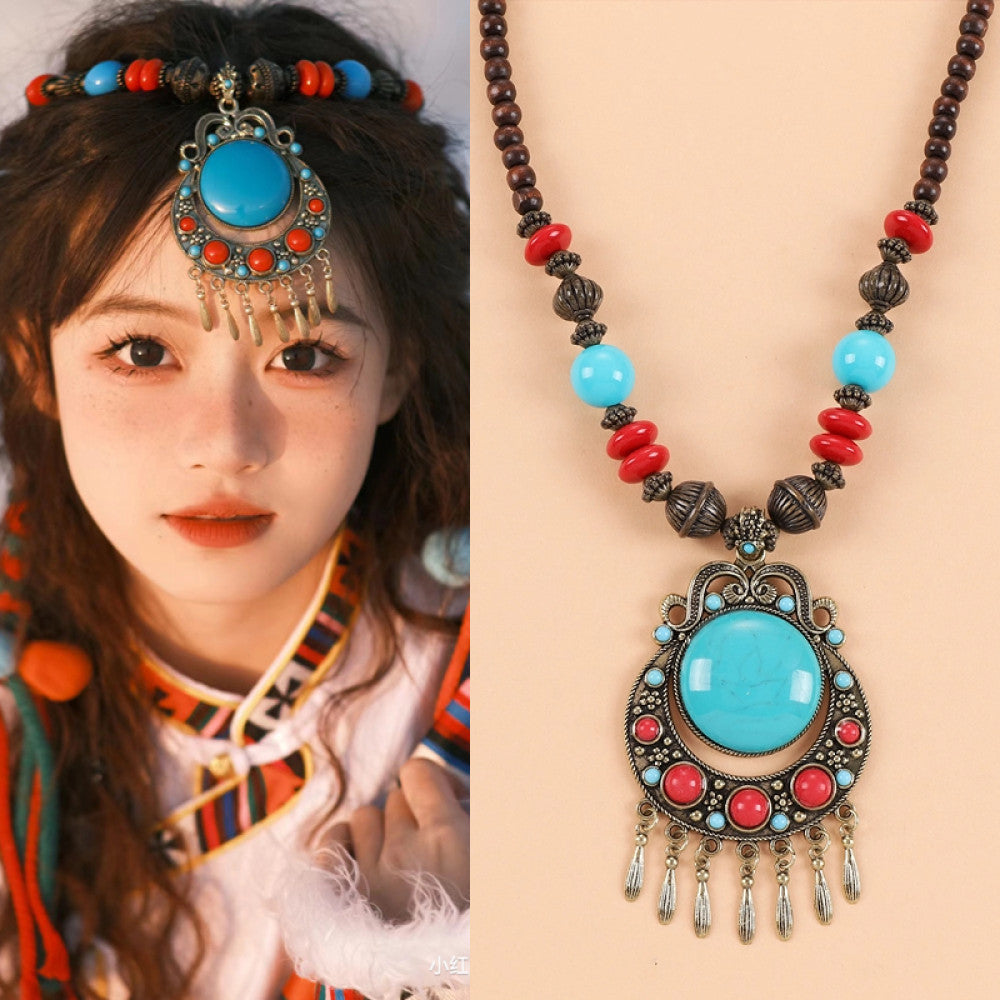 Ethnic tribal style necklace with large turquoise pendant, blue beaded design, and tassel details, perfect for bohemian vintage fashion, showcased alongside a model in traditional ethnic attire 09