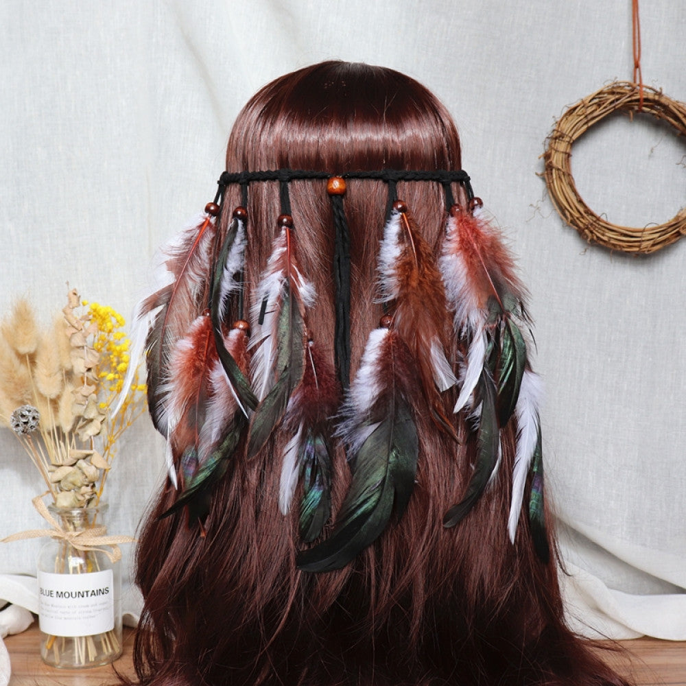 Boho bohemian macramé hair band (worn on long dark brown hair) featuring abundant white feather tassels, wooden bead accents, displayed with dried flower vase & woven wreath decor