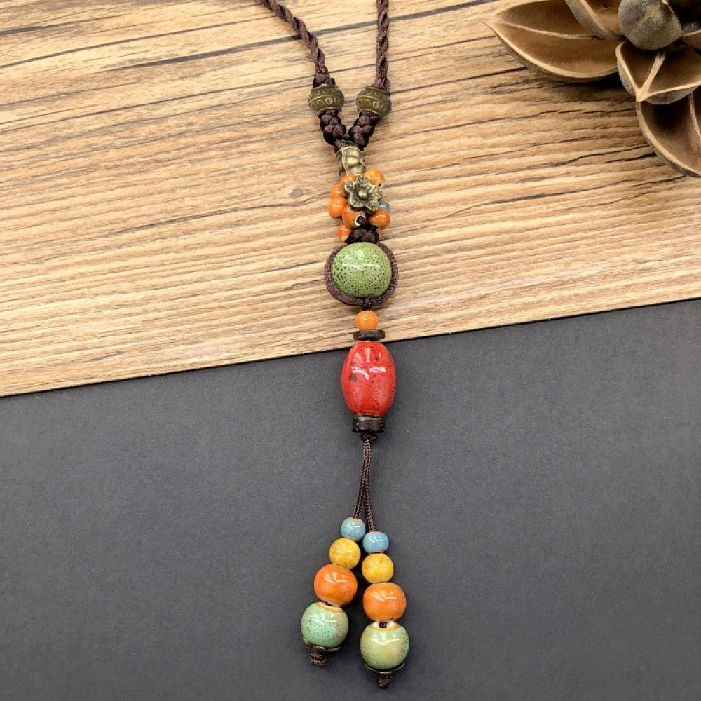 Handmade boho ceramic beaded pendant necklace with colorful beads and vintage ethnic floral design 02