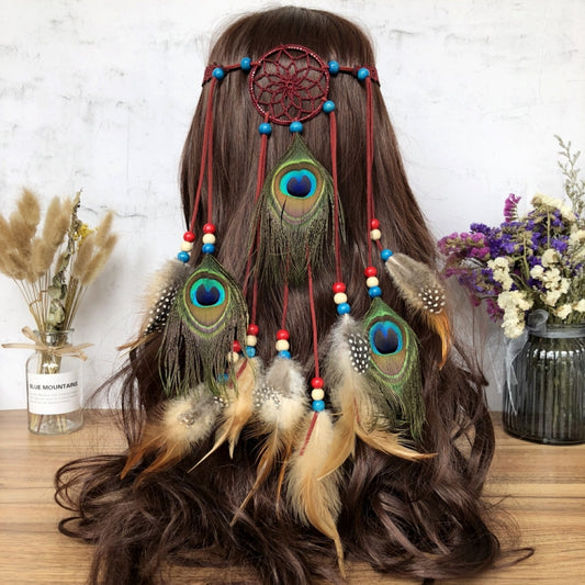 Boho leather cord hair band featuring a vibrant peacock feather, multi color feather tassels, and bead accents  displayed on a wooden surface with dried fresh flower arrangements, ideal for bohemian festival fashion enthusiasts in the US 01