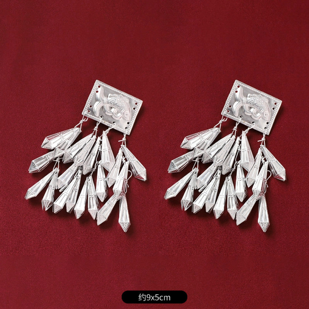 Boho vintage ethnic 2-piece silver-tone decorative ornament set featuring butterfly, lotus details, plus fish-shaped and pearl tassel pendants, ideal for bohemian retro or traditional hair/clothing styling in the US 2