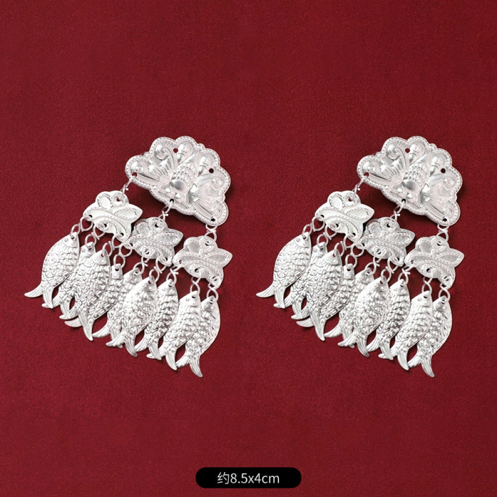 Boho vintage ethnic 2-piece silver-tone decorative ornament set (displayed on a rich red velvet background) featuring butterfly, lotus details, plus fish-shaped and pearl tassel pendants, ideal for bohemian retro or traditional hair/clothing styling in the US 01
