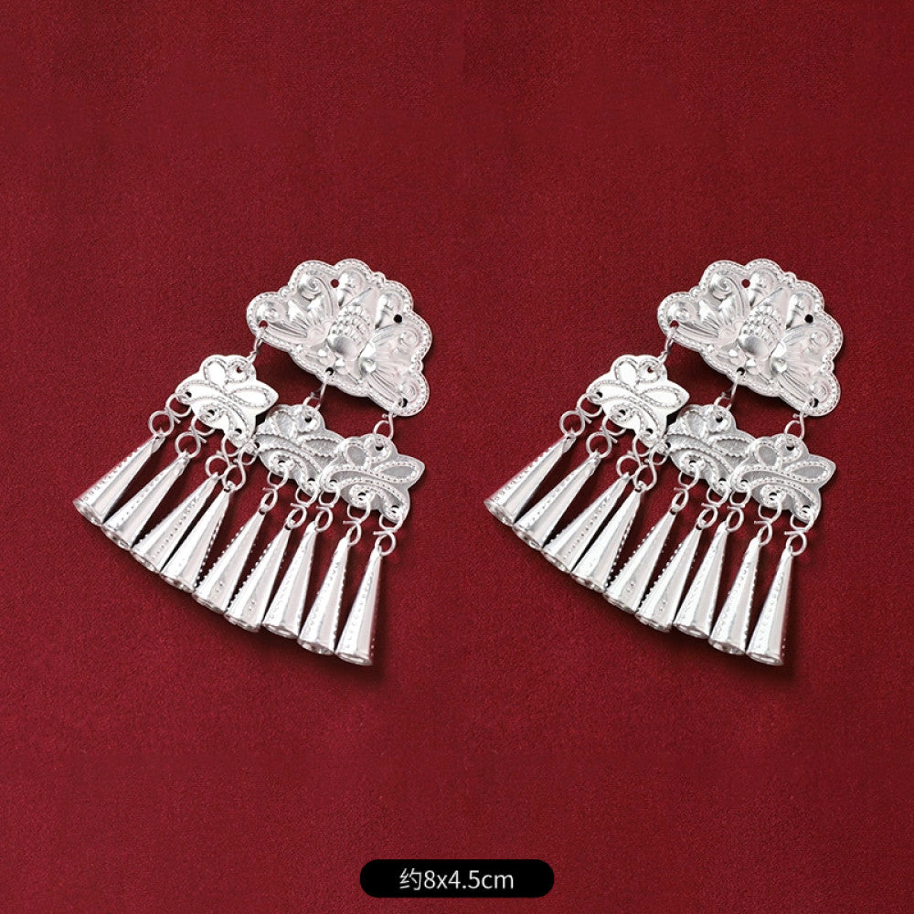 Boho vintage ethnic 2-piece silver-tone decorative ornament set (displayed on a rich red velvet background) featuring butterfly, lotus details, plus fish-shaped and pearl tassel pendants, ideal for bohemian retro or traditional hair/clothing styling in the US 2