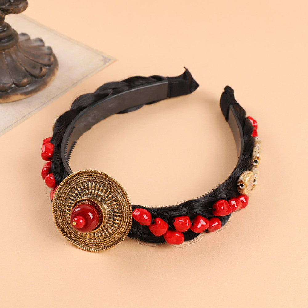 Boho vintage ethnic black braided hair hoop headband featuring a prominent gold ornament, plus red, turquoise, and yellow bead details, ideal for bohemian retro ethnic fashion styling in the US