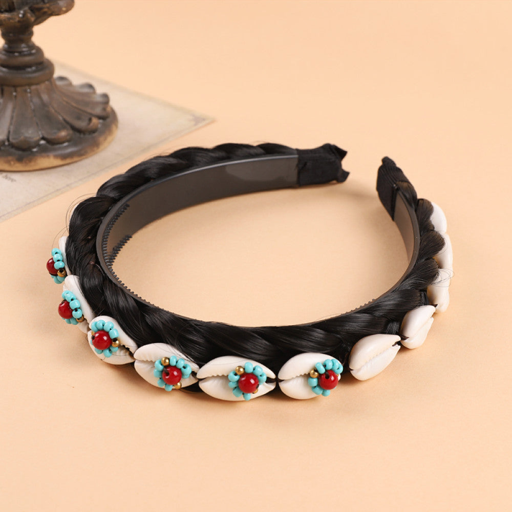 Boho vintage ethnic black braided hair hoop headband featuring a prominent gold ornament, plus red, turquoise, and yellow bead details, ideal for bohemian retro ethnic fashion styling in the US 03