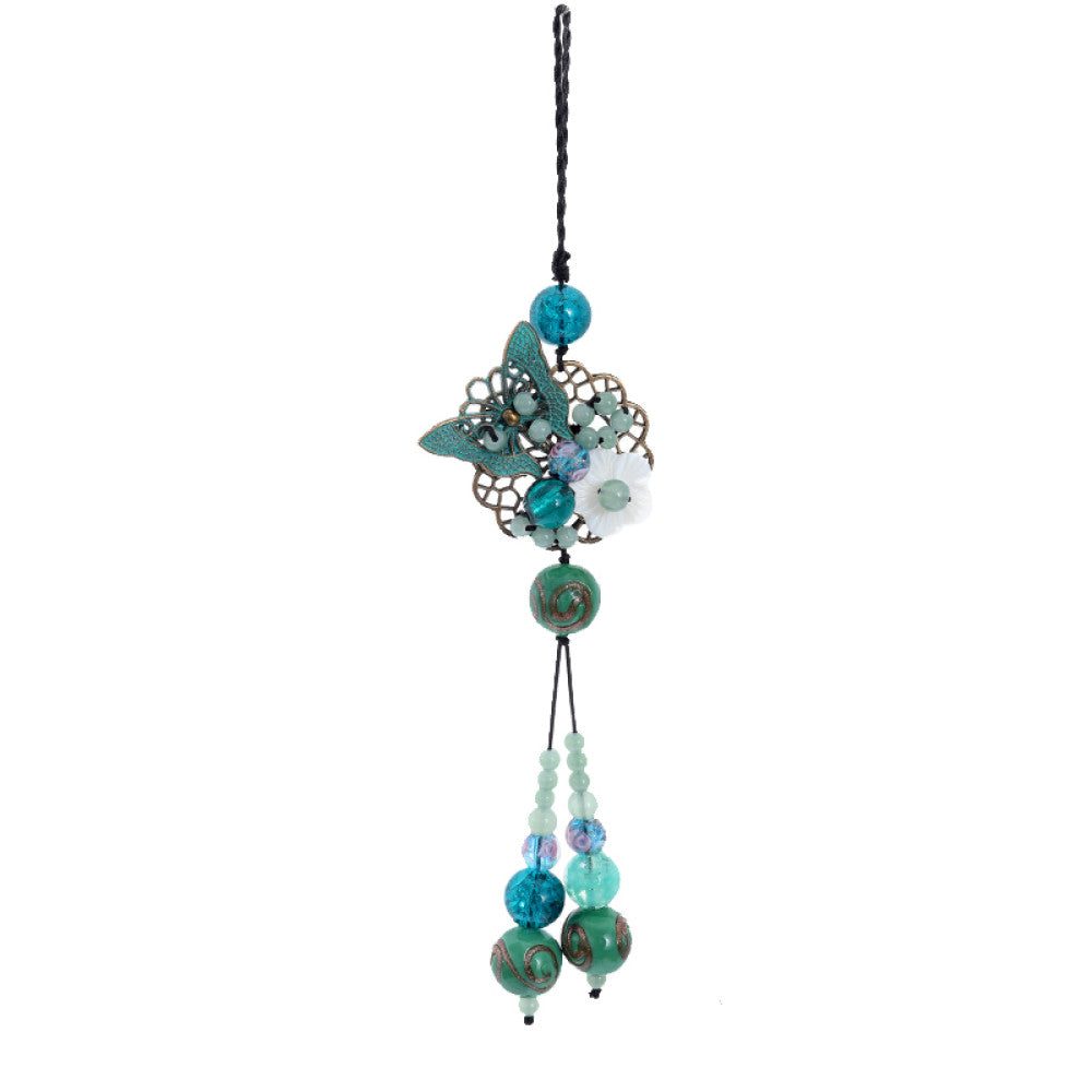 This butterfly and flower glass tassel pendant combines butterfly and flower designs with handmade glass craftsmanship, accented with light tassels, showcasing a feminine and graceful presence. 06