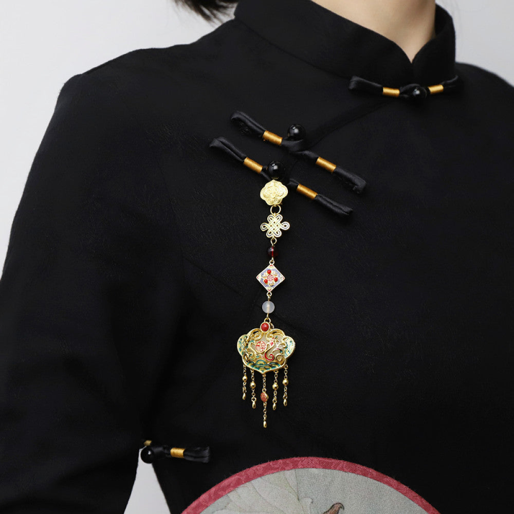 Boho vintage ethnic statement pendant charm with colorful enamel, gemstone accents and tassel details, styled on a display hook, ideal for bohemian and traditional fashion enthusiasts in the US 02