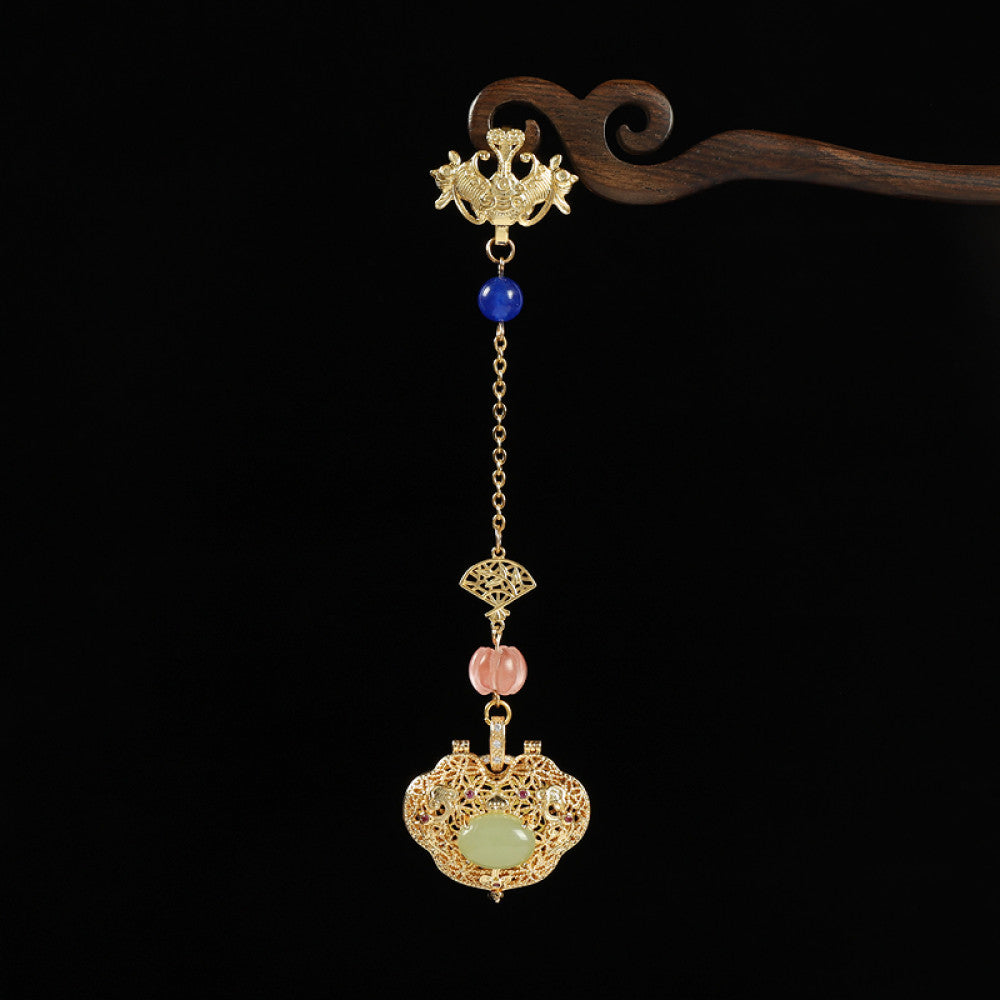 Boho vintage ethnic gold hair pendant featuring a jade-inlaid lock charm, blue/pink bead accents and intricate gold details, styled on a wooden display hook, ideal for bohemian and traditional fashion enthusiasts in the US