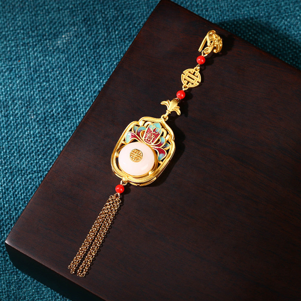 Boho vintage ethnic gold statement pendant featuring fu character, colorful enamel details, white gemstone center and gold tassel, styled on a tree branch, ideal for bohemian and traditional fashion enthusiasts in the US 02