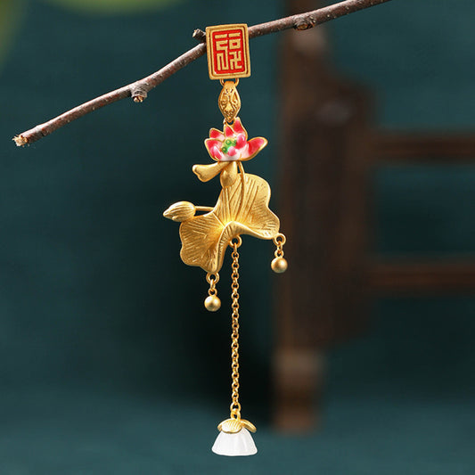 Boho vintage ethnic gold pendant featuring fu character, colorful floral charm and bell tassel details, styled on a tree branch, ideal for bohemian and traditional fashion enthusiasts in the US