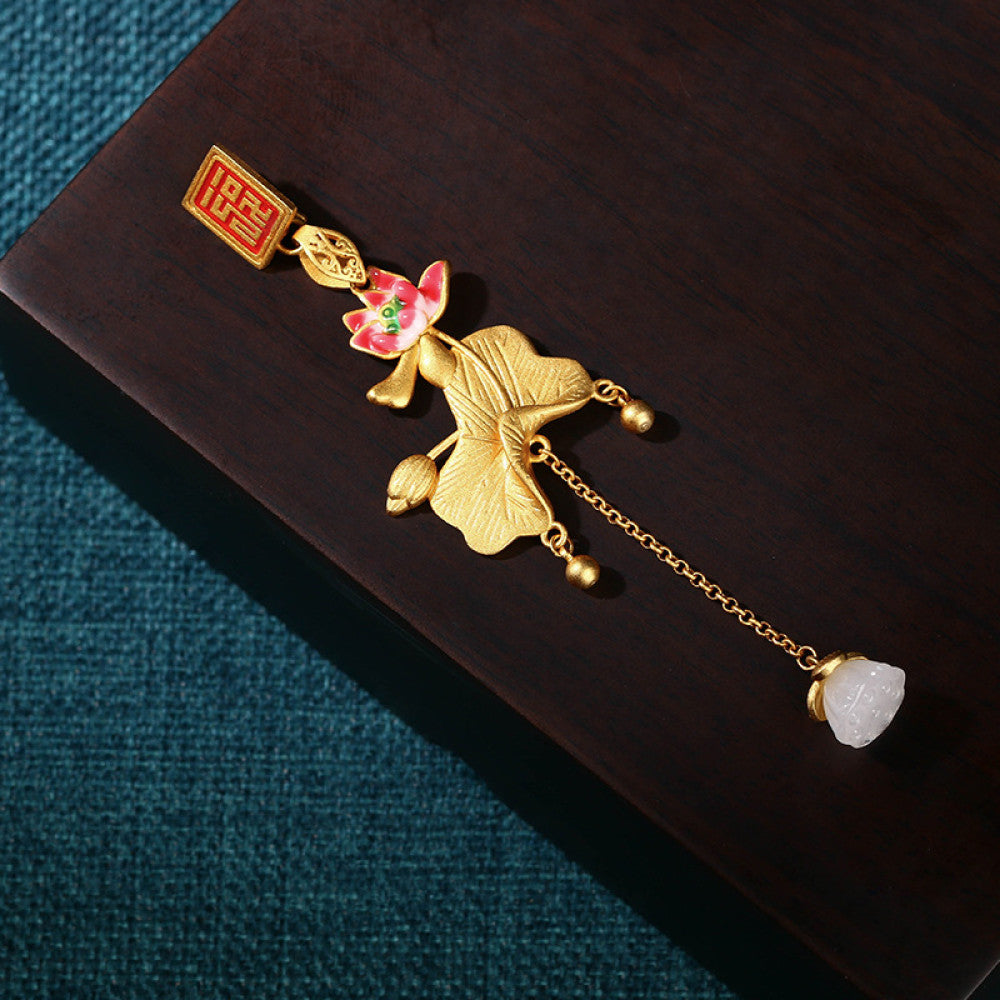 Boho vintage ethnic gold pendant featuring fu character, colorful floral charm and bell tassel details, styled on a tree branch, ideal for bohemian and traditional fashion enthusiasts in the US 02