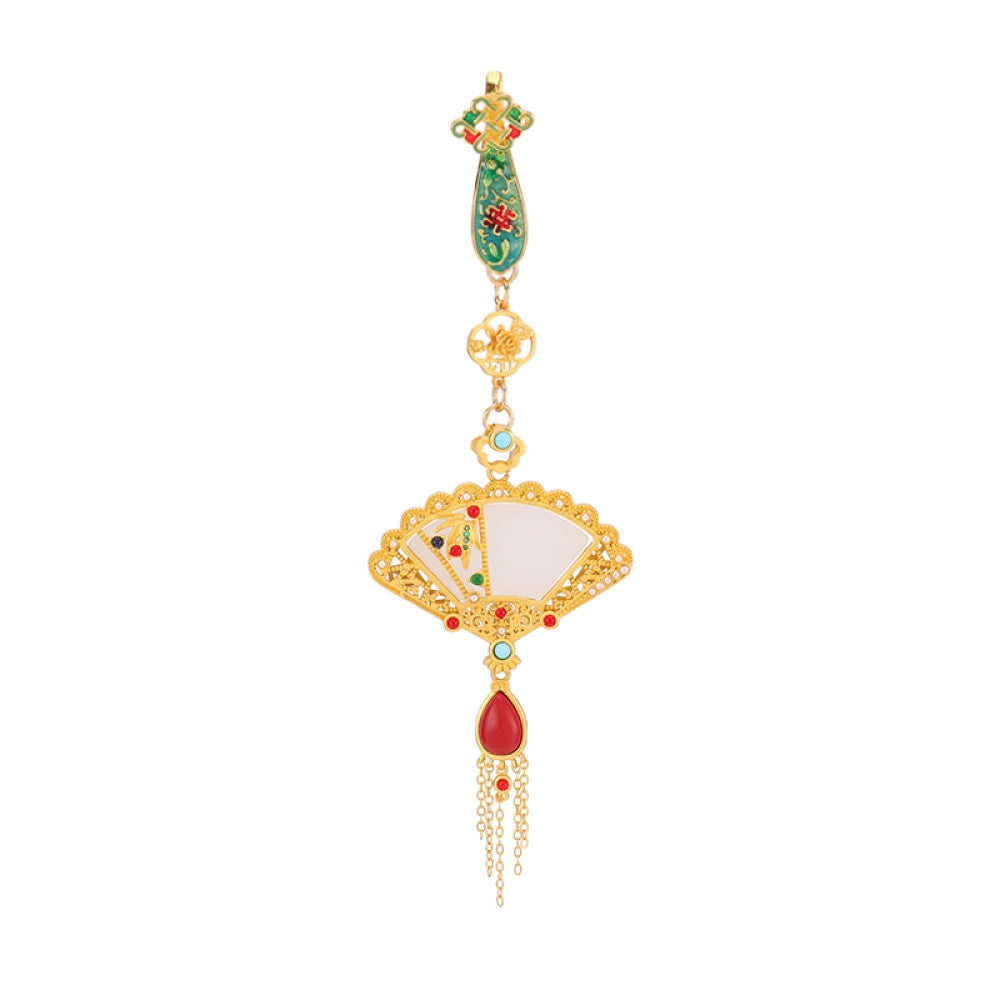 Boho vintage ethnic gold-tone hair pendant featuring green enamel detail, fan-shaped white shell charm, red gemstone accents and delicate tassel, styled on a wooden display hook, ideal for bohemian and traditional fashion enthusiasts in the US 04