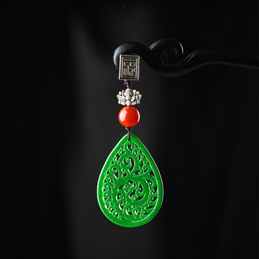 Boho vintage ethnic green cutout hair pendant charm featuring red bead and fu character detail, styled on a display hook, ideal for bohemian and traditional fashion enthusiasts in the US
