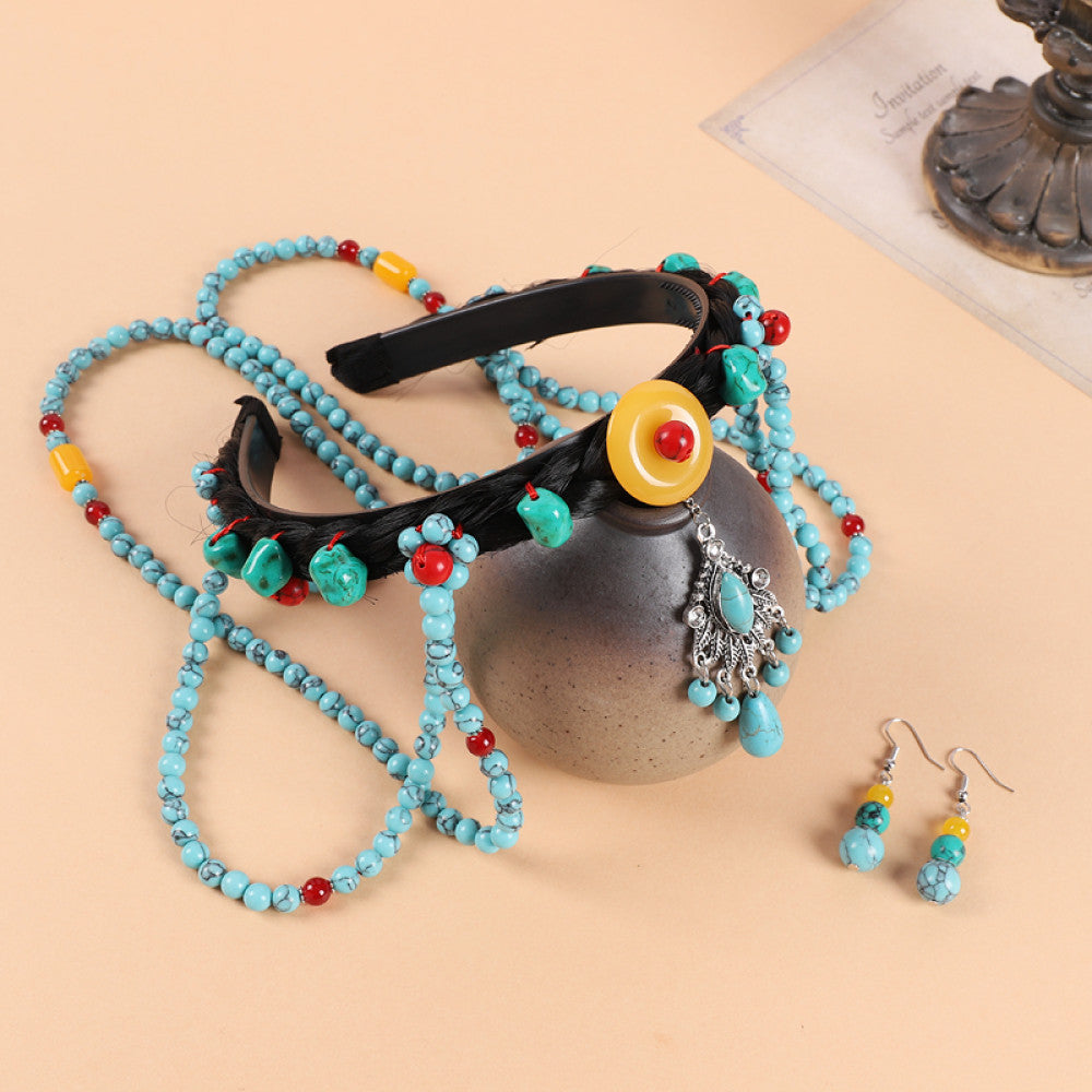 Boho vintage ethnic 2-in-1 hair band + necklace set (displayed with a gray vessel on soft beige background) featuring turquoise/red beads, a yellow decorative element, and a turquoise fringe pendant