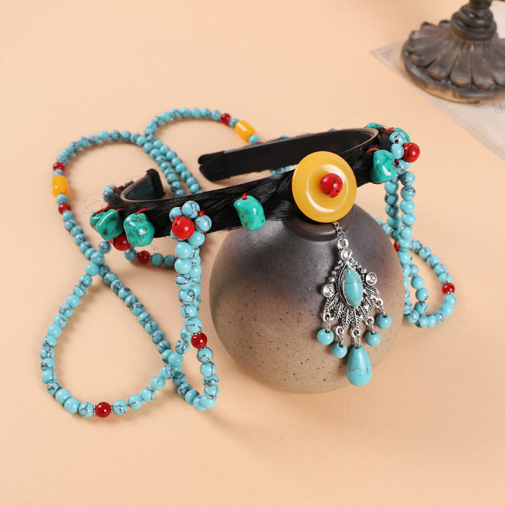 Boho vintage ethnic 2-in-1 hair band + necklace set (displayed with a gray vessel on soft beige background) featuring turquoise/red beads, a yellow decorative element, and a turquoise fringe pendant, ideal for bohemian casual fashion styling in the US