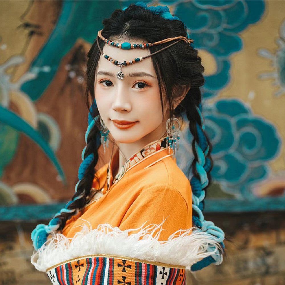 Boho vintage ethnic hair jewelry set (turquoise bead forehead chain + braided hair decorative accents) styled with ethnic orange costume & braided hair, displayed against a painted wall background