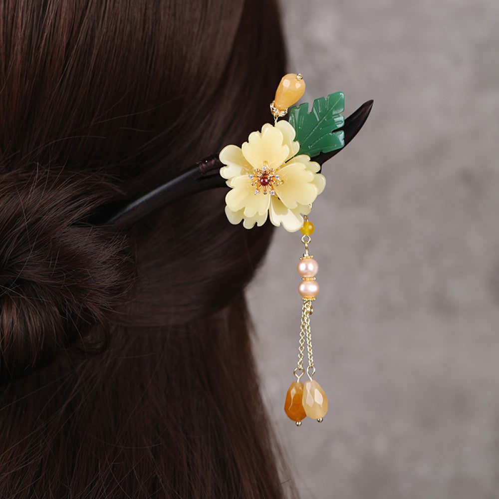 Boho vintage ethnic hair stick ornament featuring a pink flower green leaf accents, pink/green bead tassel, and light green leaf pendant, displayed against a muted gray background 03