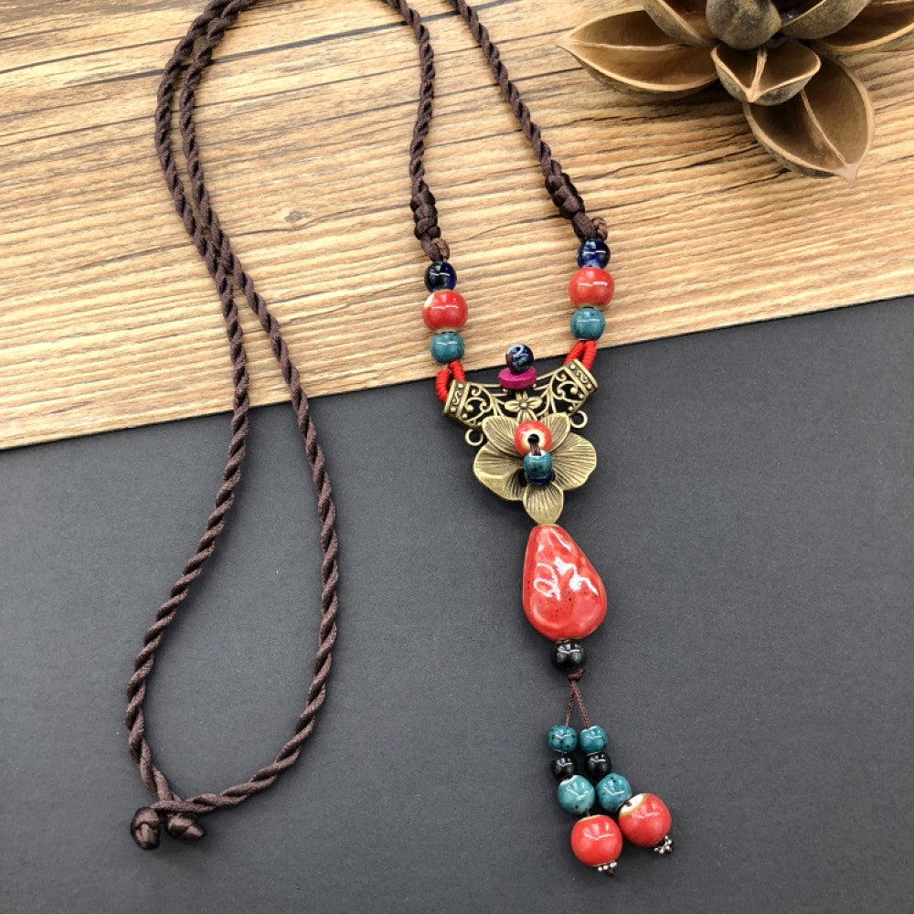 Boho vintage ethnic pendant necklace with colorful beads, engraved metal moon design and tassel 01