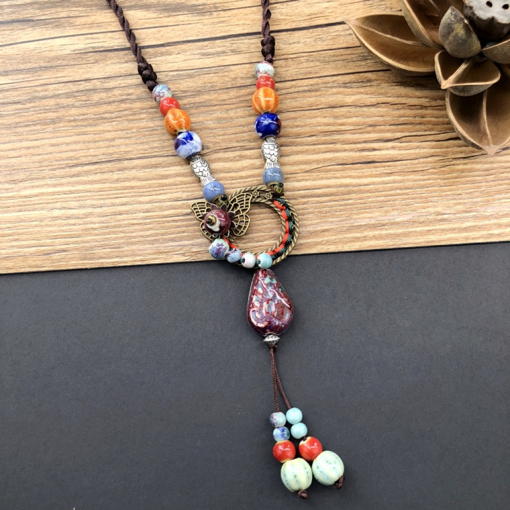 Boho vintage ethnic pendant necklace with colorful beads, engraved metal moon design and tassel 02