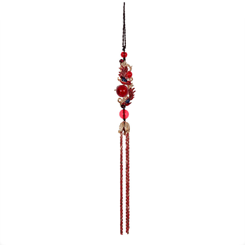 Boho vintage ethnic red-tone hair pendant featuring black cord, intricate red dragon charm (with decorative details), red bead accents, and long red-gold fringe tassels, styled against a black fabric background, ideal for bohemian and traditional fashion enthusiasts in the US 05