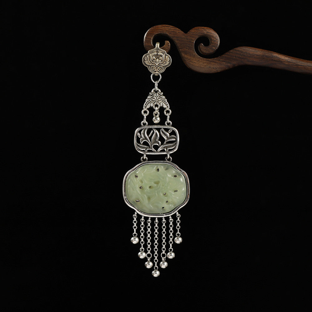 Boho vintage ethnic silver hair pendant with jade-inlaid openwork charm and silver tassel details, styled on a wooden display hook, ideal for bohemian and traditional fashion enthusiasts in the US