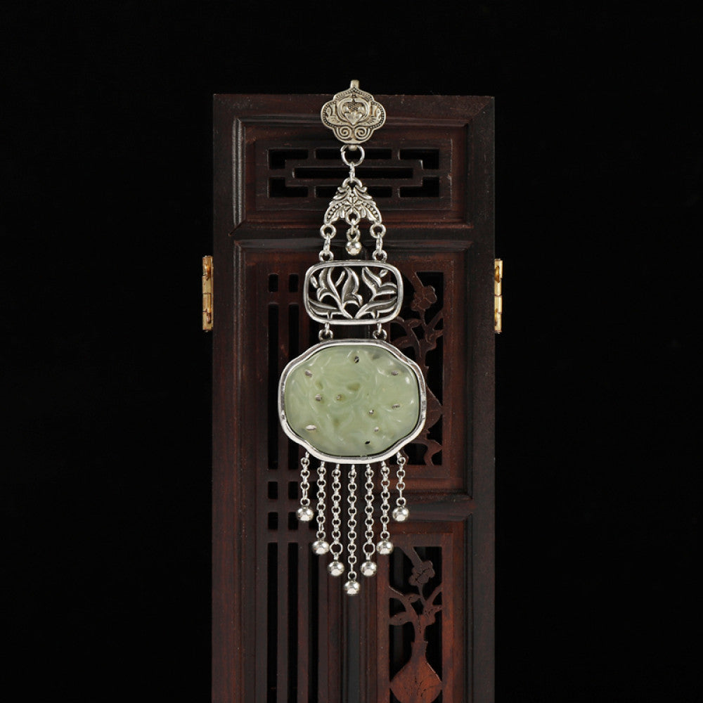 Boho vintage ethnic silver hair pendant with jade-inlaid openwork charm and silver tassel details, styled on a wooden display hook, ideal for bohemian and traditional fashion enthusiasts in the US 02