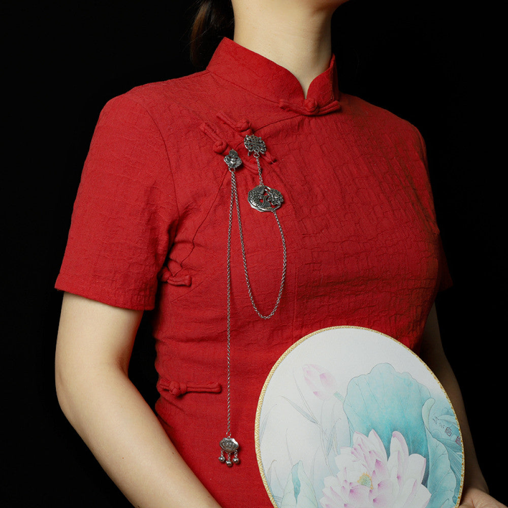 Boho vintage ethnic silver long chain statement pendant with carved charm and bell details, styled on a display hook, ideal for bohemian and traditional fashion enthusiasts in the US 02