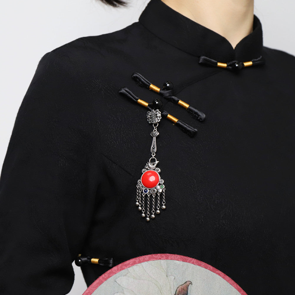 Boho vintage ethnic silver hair pendant charm with red gemstone and tassel details, styled on a display hook, ideal for bohemian and traditional fashion enthusiasts in the US 02