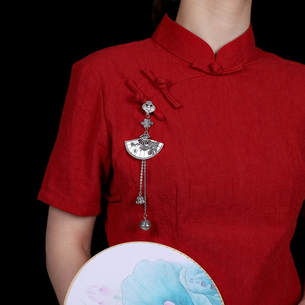 Boho vintage ethnic silver hair pendant featuring fan-shaped openwork charm, decorative tassel details, styled on a wooden display hook, ideal for bohemian and traditional fashion enthusiasts in the US 01