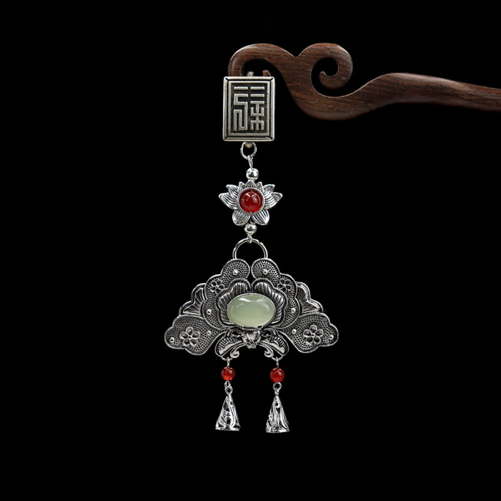 Boho vintage ethnic silver hair pendant featuring fu character, red gemstone accents, jade-inlaid fan-shaped charm and red tassel details, styled on a wooden display hook, ideal for bohemian and traditional fashion enthusiasts in the US