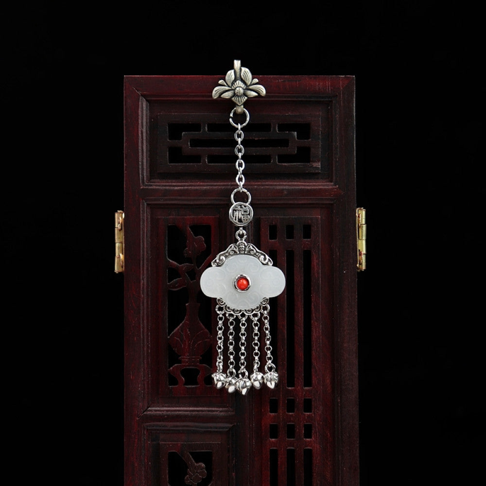 Boho vintage ethnic silver hair pendant featuring red gemstone center, clover-shaped white charm and silver tassel details, styled on a woo 01