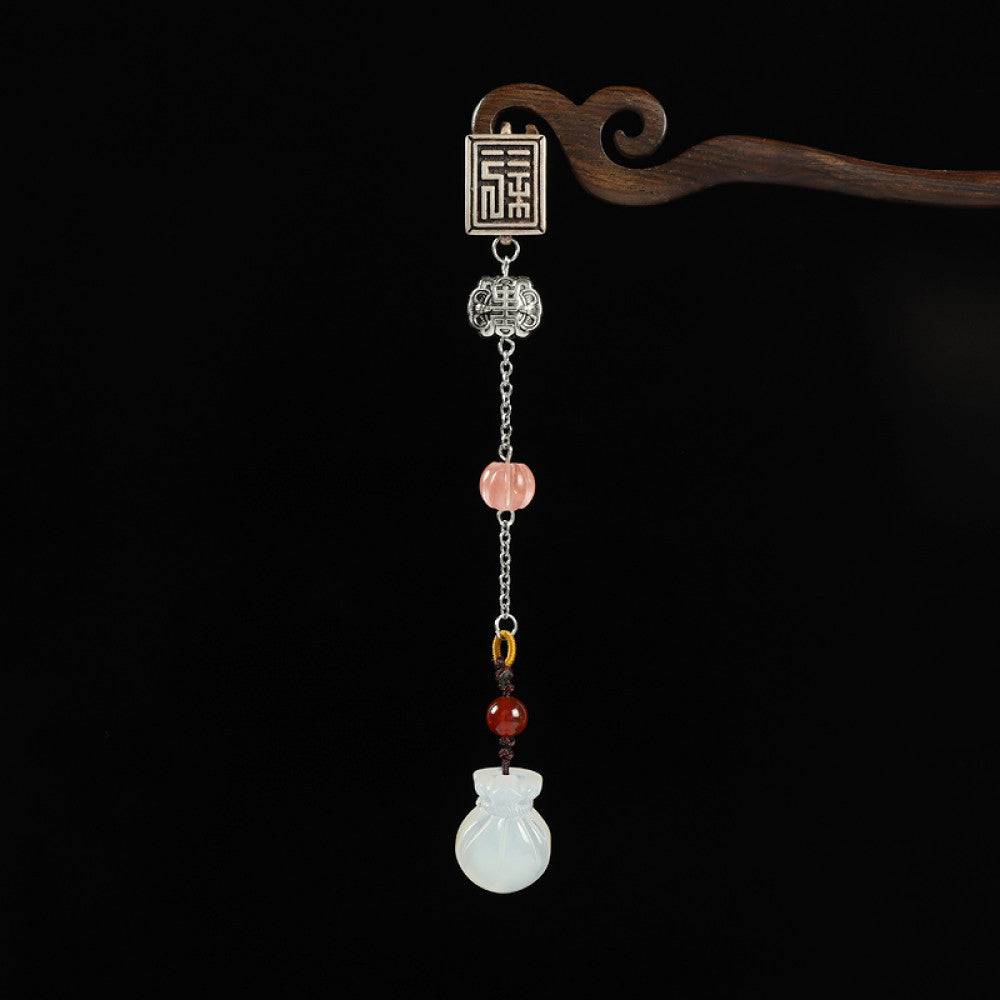 Boho vintage ethnic silver hair pendant featuring a ruyi-shaped jade charm, pink/yellow/red bead accents and decorative clasps, styled on a wooden display hook, ideal for bohemian and traditional fashion enthusiasts in the US 01