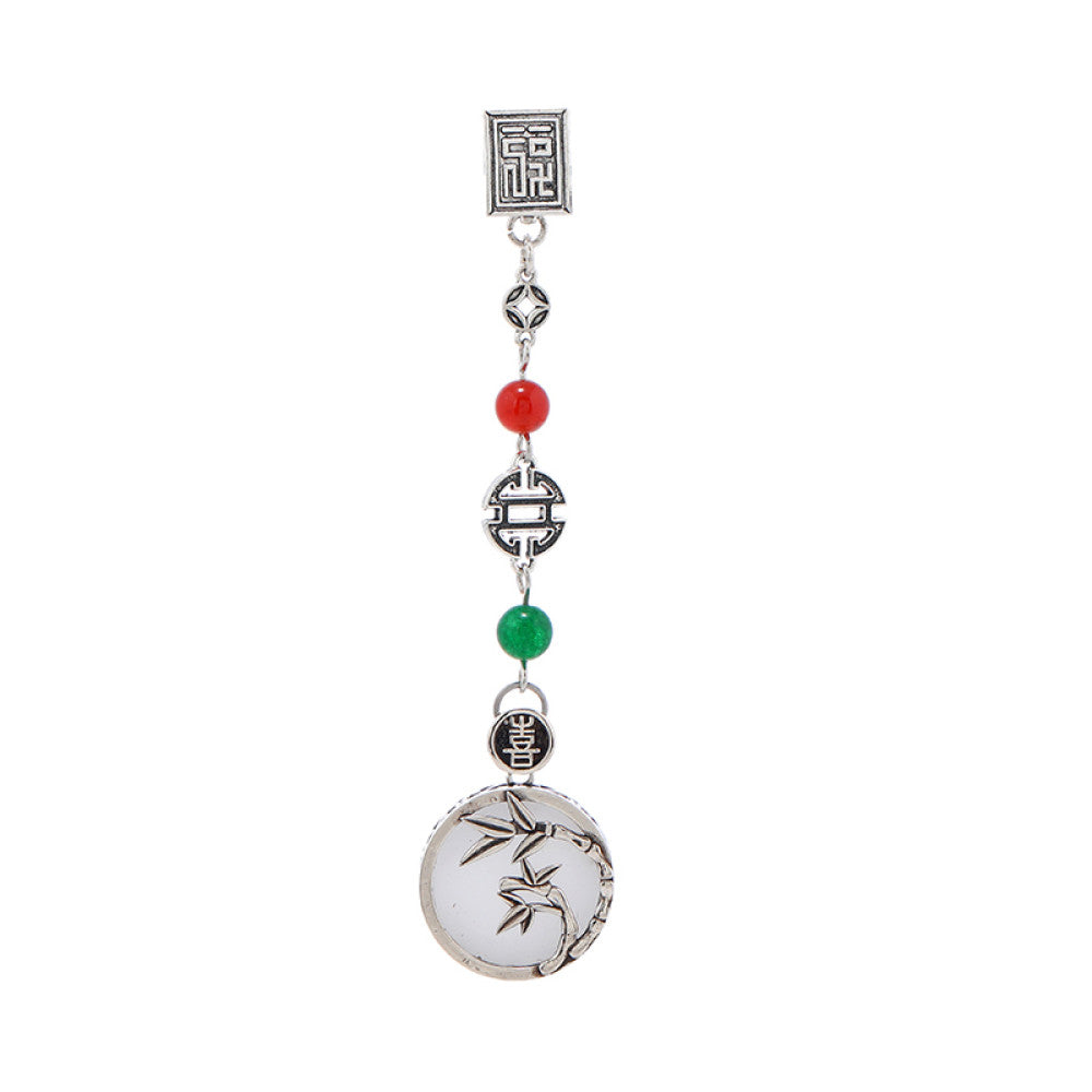 Boho vintage ethnic silver pendant charm featuring fu character, red & green beads, and a carved round plaque, styled on a display hook, ideal for bohemian and traditional fashion enthusiasts in the US 05