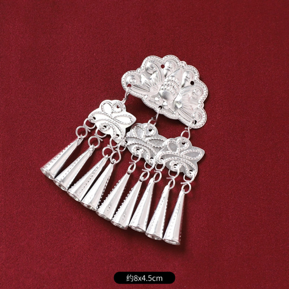 Boho vintage ethnic silver-tone decorative brooch/ornament (displayed on a rich red velvet background) featuring butterfly & lotus details, plus fish-shaped and pearl tassel pendants, ideal for bohemian retro or traditional fashion styling in the US 02