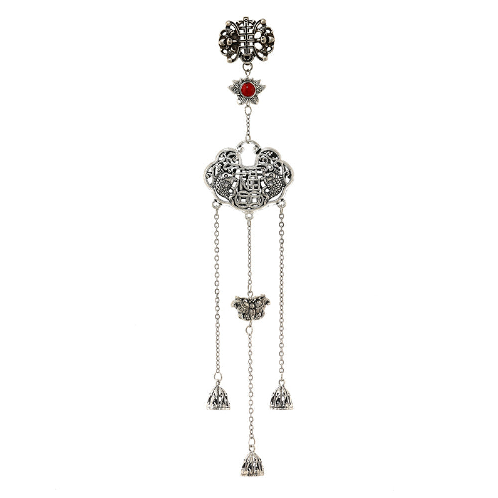 Boho vintage ethnic silver-tone hair pendant featuring Chinese knot charm, red gemstone accent, intricate openwork lock-shaped pendant and layered silver tassels, styled on a wooden display hook against a black background, ideal for bohemian and traditional fashion enthusiasts in the US 05