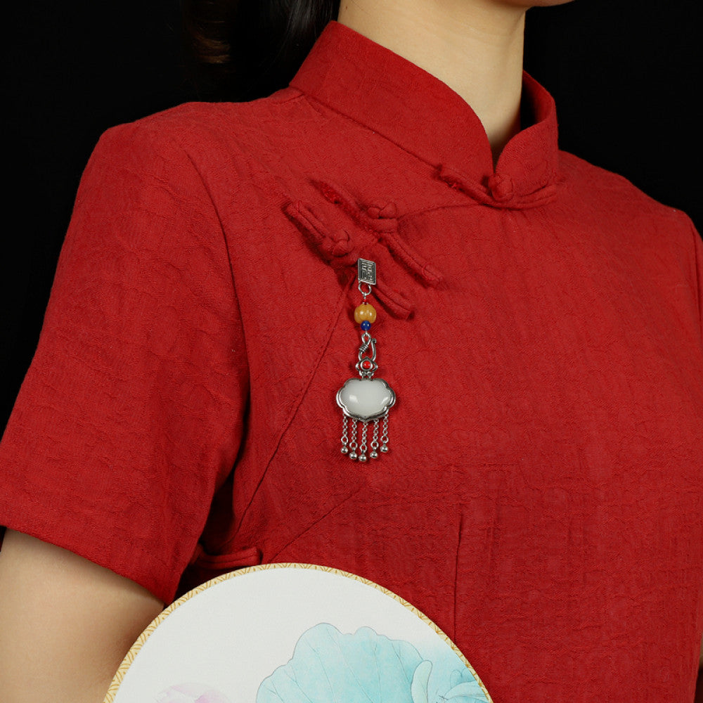 Boho vintage ethnic silver-tone hair pendant featuring Fu character detail, yellow/blue bead accents, red gemstone decoration, white lock-shaped pendant and silver tassel details, styled on a wooden display hook against a black background, ideal for bohemian and traditional fashion enthusiasts in the US 06