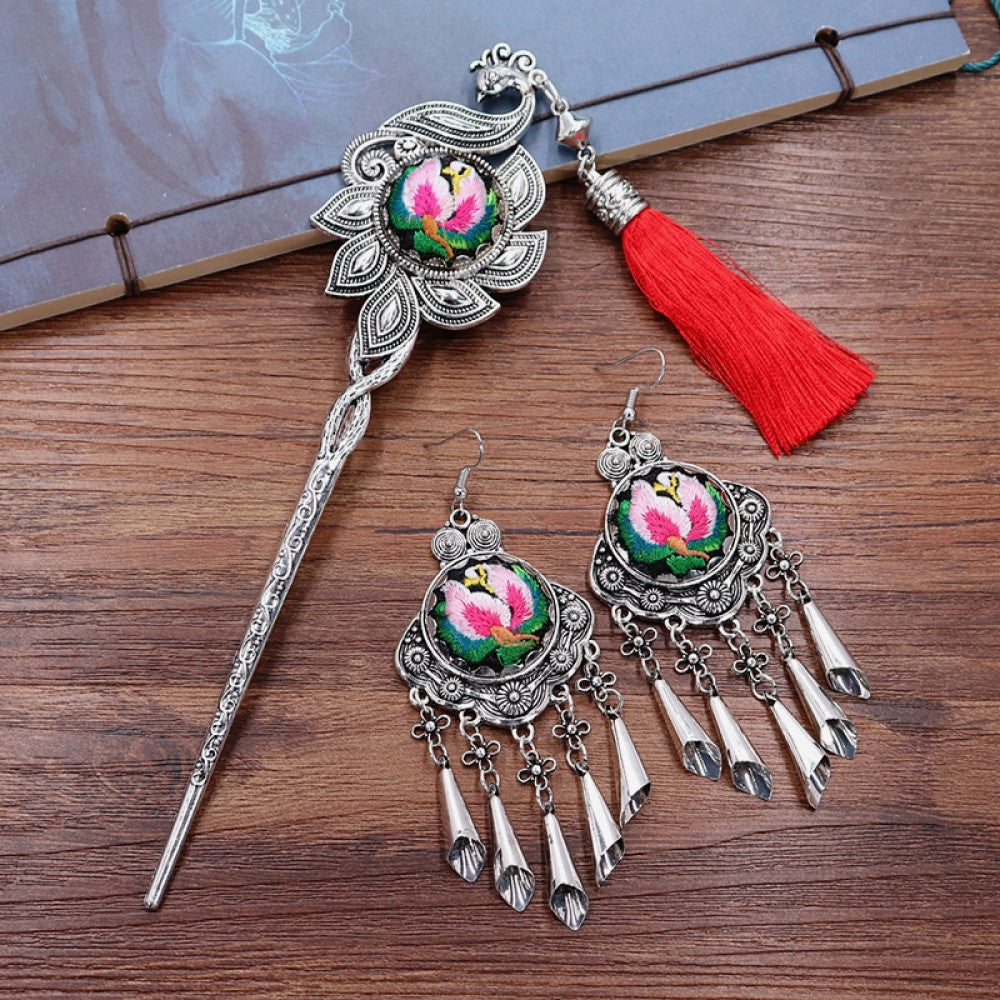 Boho vintage ethnic silver-tone hair stick & earring set (displayed on a wooden surface with a patterned notebook) featuring enamel purple flower details and silver fringe pendants, ideal for bohemian retro or traditional fashion styling in the US 03